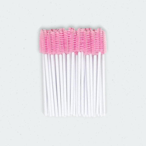 Pink and white mascara wands, also known as spoolie's. Used by lash trainers and technicians when applying eyelash extensions. Lash supplies and courses by Lash Boss Melbourne